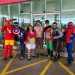 Frentistas da Rede de Postos Ceará trabalham com fantasias de super-heróis em comemoração ao dia das crianças